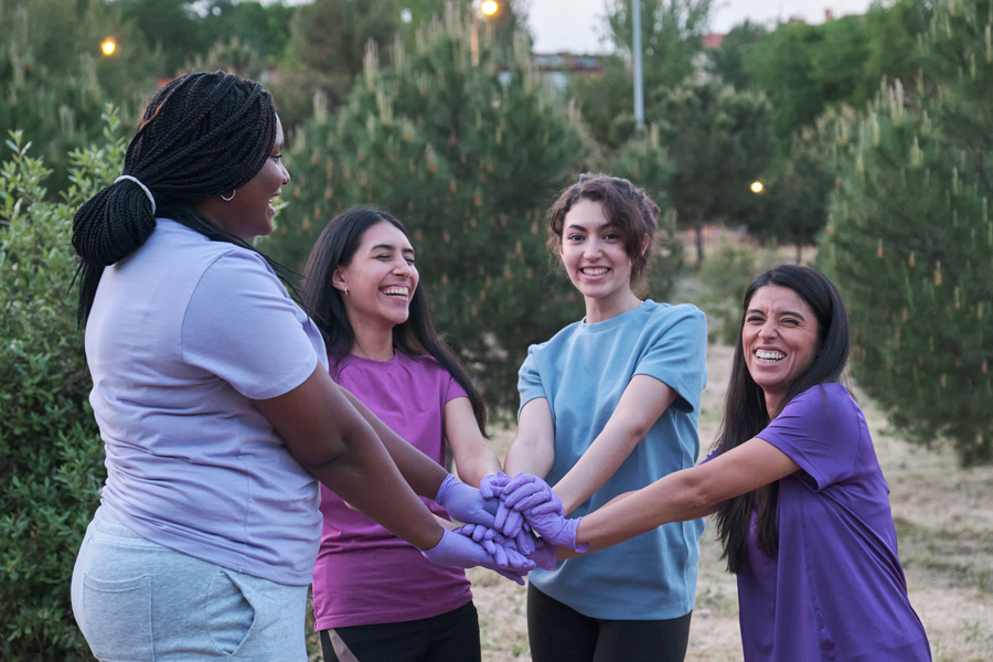 objectives-img women wearing purple gloves
